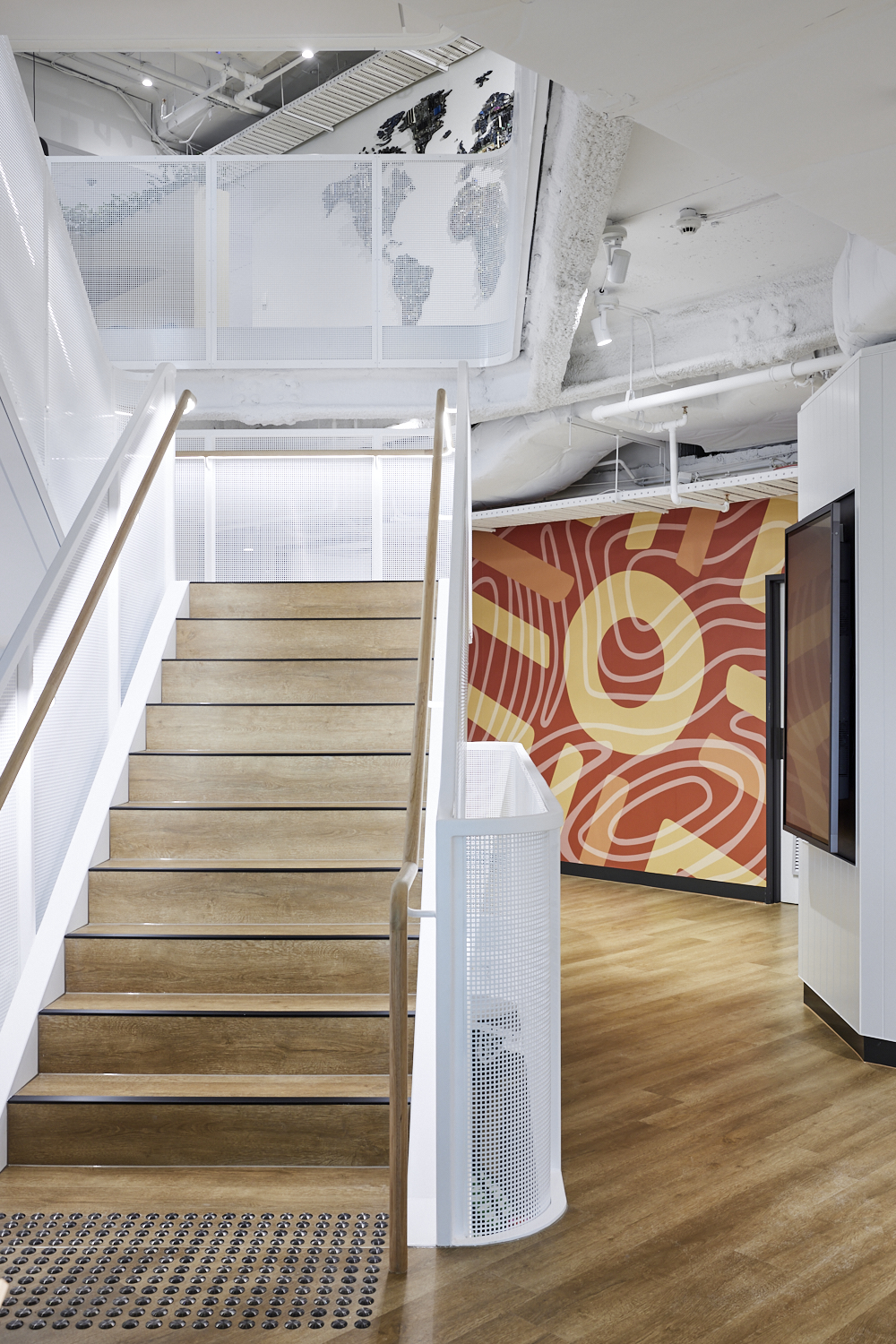 Dennis Golding mural in an office