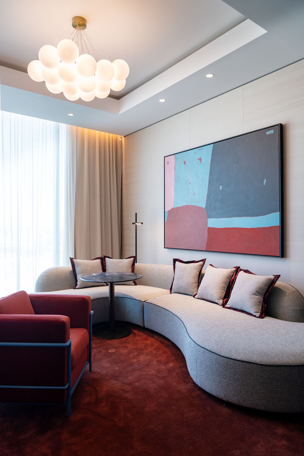 Interior of The Darling at The Star Sydney with artwork above sofa by Tiarna Herczeg