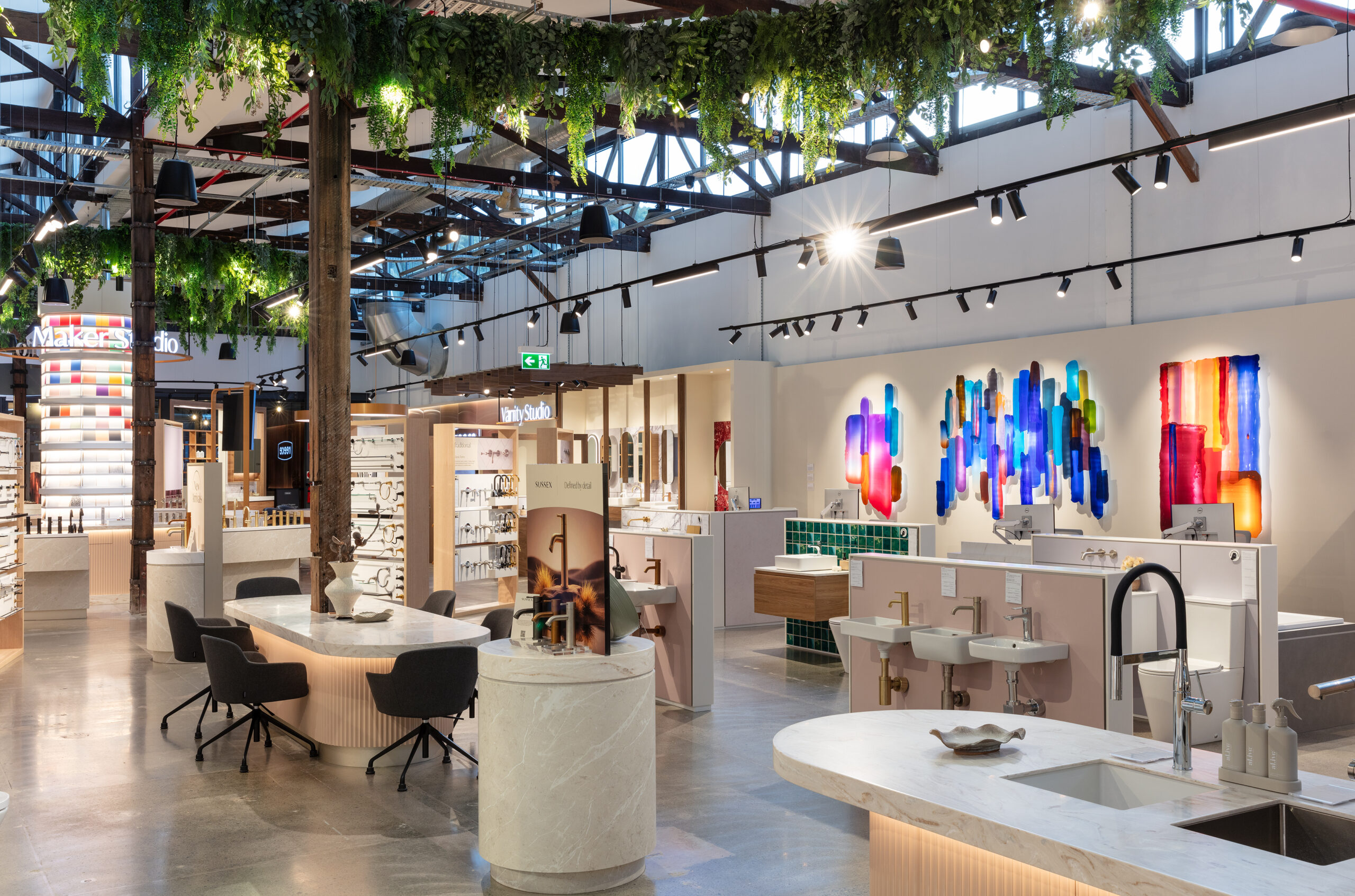 bathoom showroom with colourful light works on wall